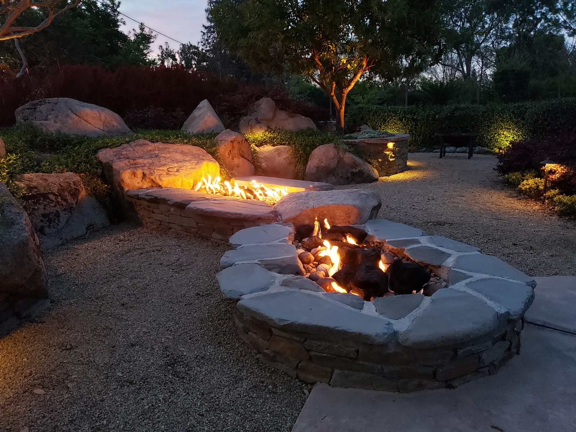 outdoor waterfall and firepit